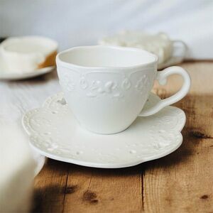 Elegant White Embossed Teacup and Saucer 6 oz.